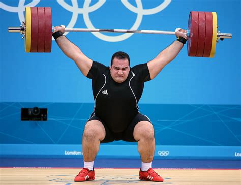 Iranian Weight Lifter Wins Gold in Men’s Super-Heavyweight Division ...