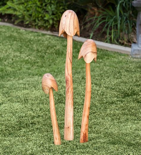 Beautifully hand-carved from Chinaberry wood, these Bell Mushroom Garden Stakes are one-of-a ...