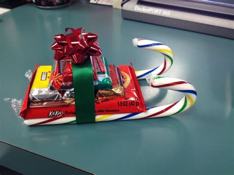 Our candy sleighs we made for the employee Christmas Party this year. | Christmas candy gifts ...