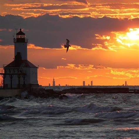 Michigan city lighthouse. Chicago skyline, sunset | Michigan city, Chicago skyline, Us coast guard