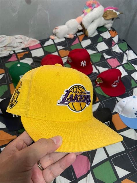 Lakers OG logo by New Era, Men's Fashion, Watches & Accessories, Caps & Hats on Carousell