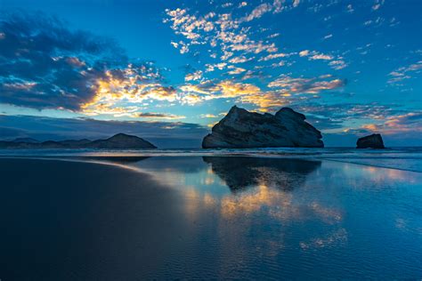 Wharariki Beach sunset Takaka South Island, New Zealand