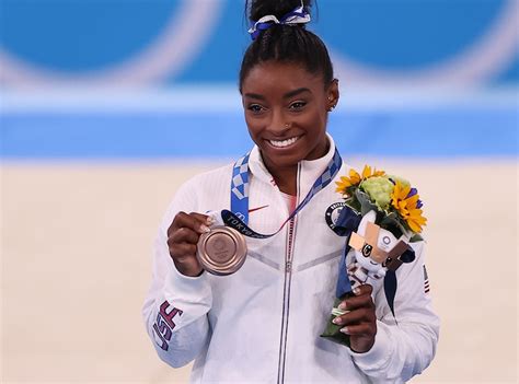 Photos from These Are the Olympians We're Still Rooting For