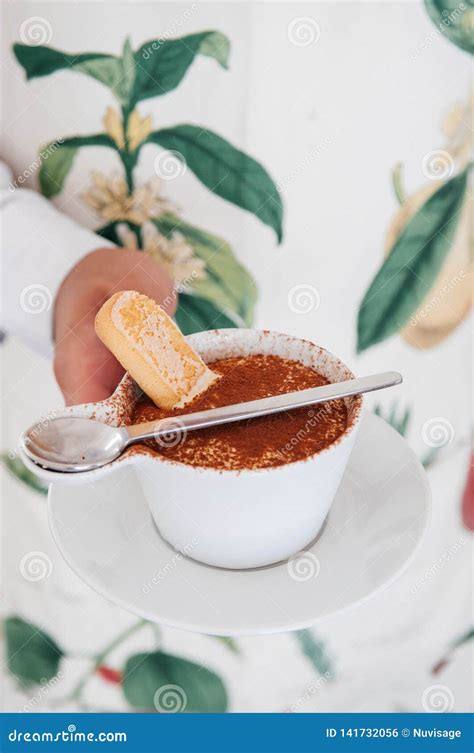 Italian Tiramisu in White Cup with Ladyfinger Biscuit Stock Photo ...