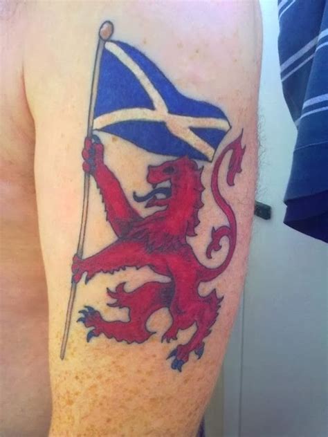 Red lion with blue flag scotland tattoo - Tattooimages.biz