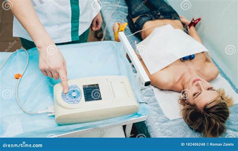 Doctor with Electrocardiogram Equipment Making Cardiogram Test Stock Photo - Image of cardio ...