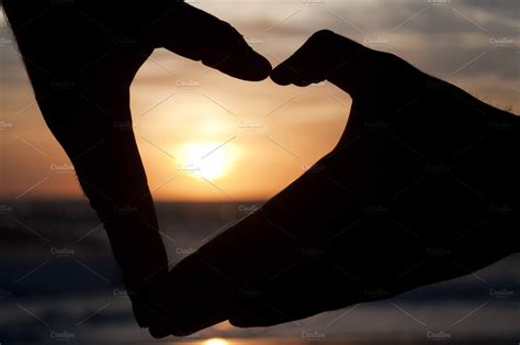 Hands forming a heart at the sunset featuring sunset, heart, and love ...