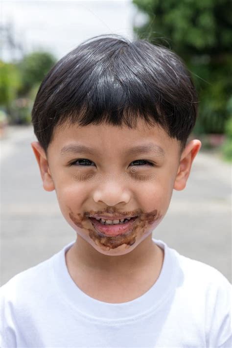 Child Face Messy and Dirty by Chocolate Ice Cream. Child with Face ...