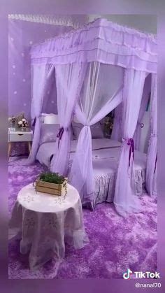 Romantic Bedroom Decor with Purple Carpet and Canopy Bed