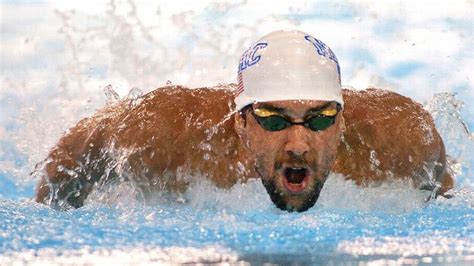 Michael Phelps wins 100 butterfly - ABC7 Chicago