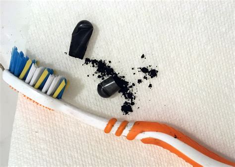 I Brushed My Teeth With Charcoal For 2 Weeks—Here’s What Happened ...