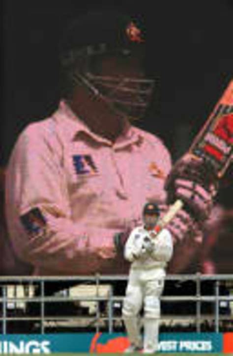 Mark Taylor in his 100th test match is dwarfed by his own image on a ...