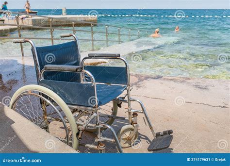 Accessible Beach with Wheelchair Stock Image - Image of sitting, care: 274179631