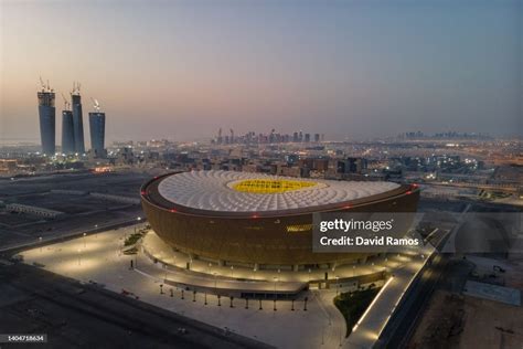 An aerial view of Lusail Stadium at sunrise on June 20, 2022 in Doha ...