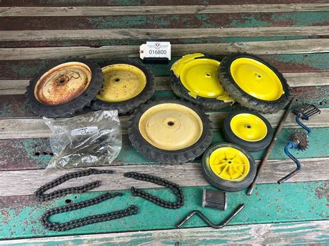 Assorted John Deere Pedal Tractor Parts - Gavel Roads Online Auctions