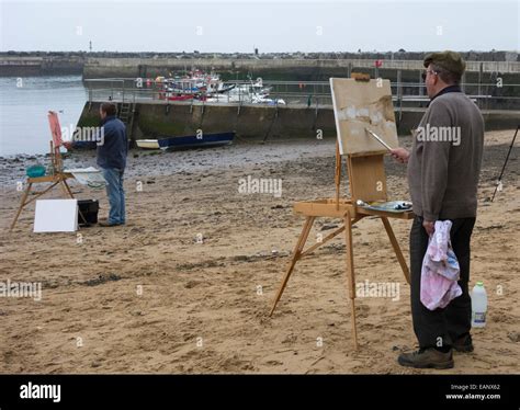 Artists painting at Staithes during Staithes Art festival weekend. North Yorkshire, England. UK ...