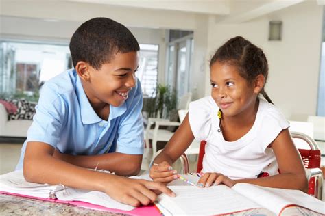 Child Doing Homework - Routines and incentive systems to help kids succeed