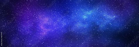 Night starry sky and bright blue galaxy, horizontal background banner Stock Photo | Adobe Stock