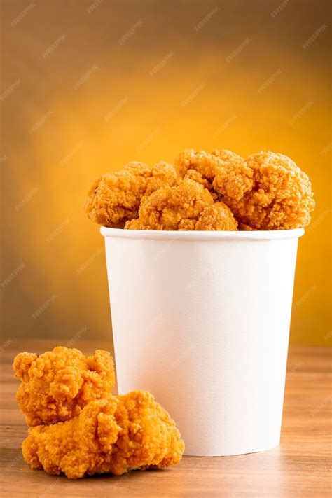 Premium Photo | Crispy fried chicken in the bucket chicken bucket