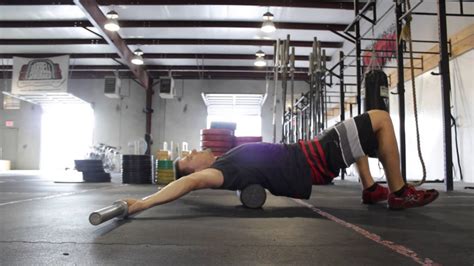 Weighted Shoulder Stretch for Overhead Position - All Things Gym