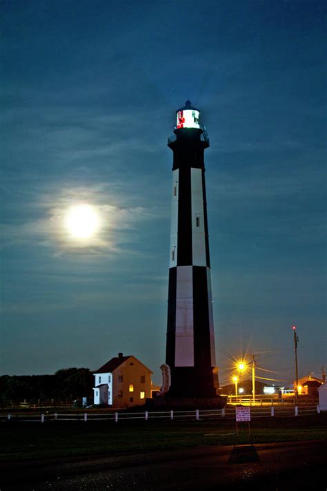 Fort Story Lughthouse Under the Moon Photograph by Greg Frederick - Pixels