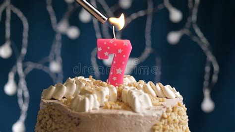 Birthday Cake with 7 Number Pink Candle on Blue Backgraund. Candles are ...