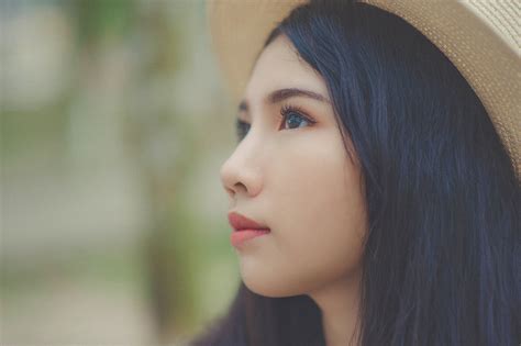 Woman Wearing Brown Bucket Cap · Free Stock Photo