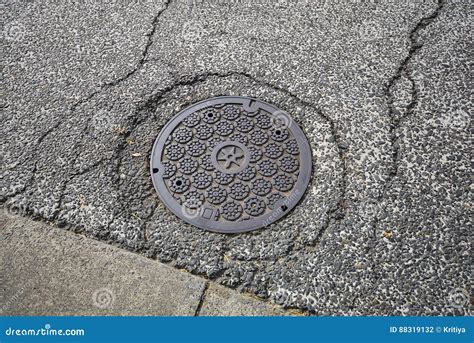 Drain Cap Art on the Surface of Sewer Cover on the Walk Way Stock Photo ...