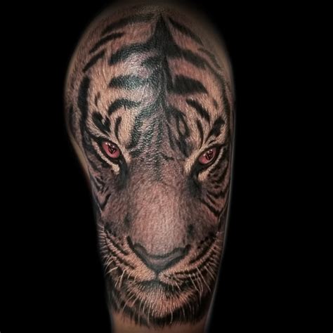 realistic tiger tattoo done at Masterpiece Tattoo in San Francisco