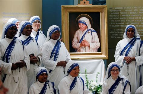 Members of Mother Teresa's order, the Missionaries of Charity, gather around the official ...