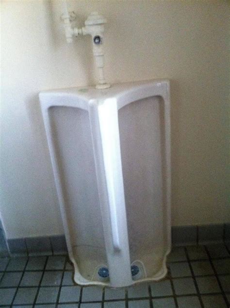 The most awkward urinal design ever. : funny