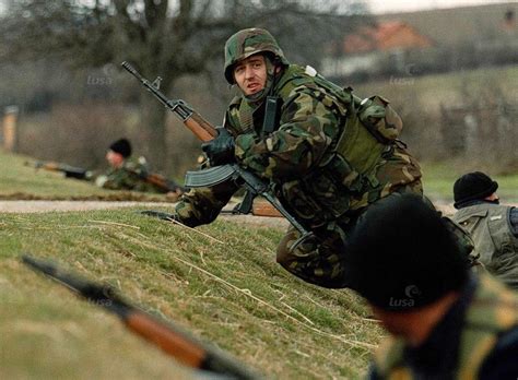 Serbian Police involved in a firefight with the KLA on the road between ...