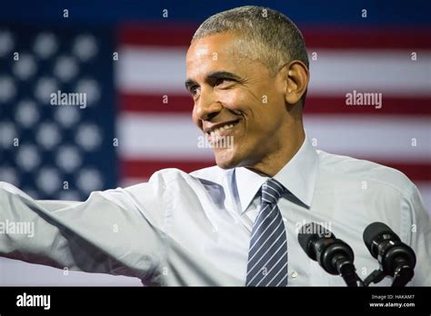 Obama smiling hi-res stock photography and images - Alamy