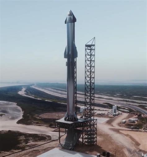 Leaked official render of SpaceX Starship Super Heavy at launch pad in Boca Chica, Texas John ...