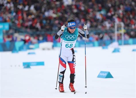 Photo Of North Korean Coaches Cheering On South Korean Athlete Goes Viral