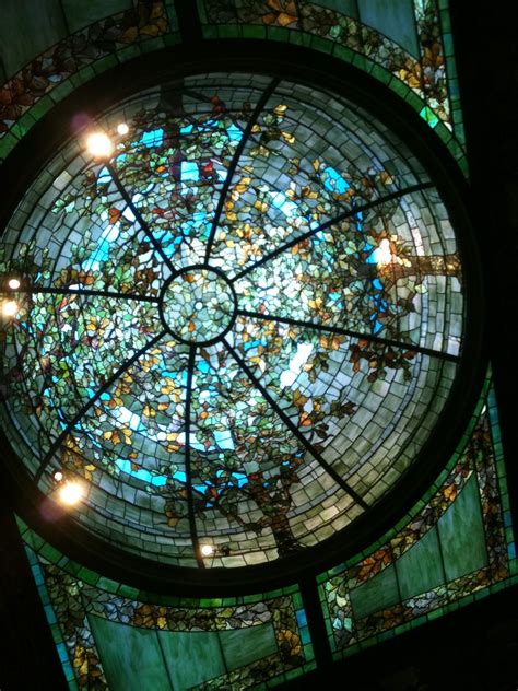 An enormous stained glass dome using Kokomo Opalescent Glass in the Driehaus Museum in Chicago ...