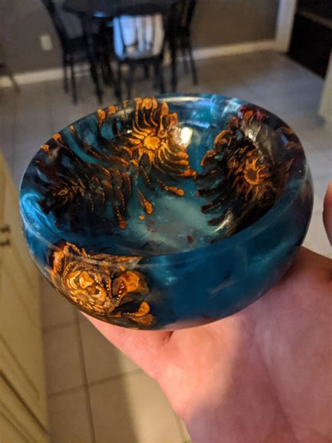 Epoxy bowl with pine cones. : turning