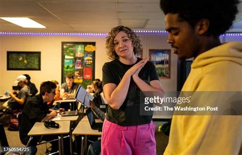 Kamiak High School english teacher Rachel Johnson works with students ...