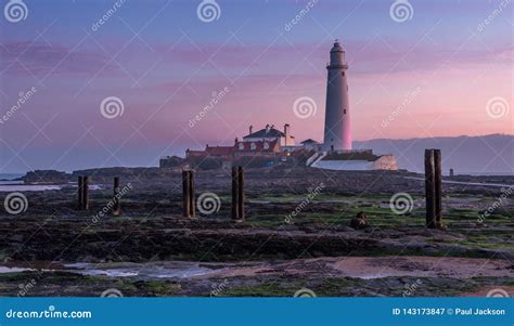 St Mary`s Lighthouse on a Misty Sunrise Stock Image - Image of water ...