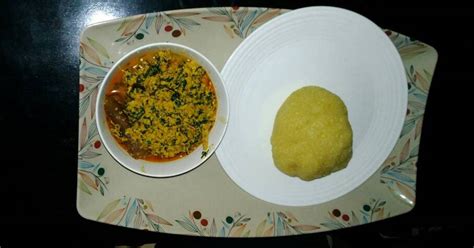 Egusi soup with yellow garri Recipe by Nonny - Cookpad