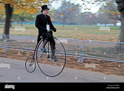 Penny Farthing bicycle rider victorian costume Hyde Park London Stock ...