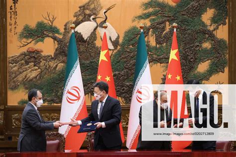 Iranian President Ebrahim Raisi and Chinese President Xi Jinping attend ...