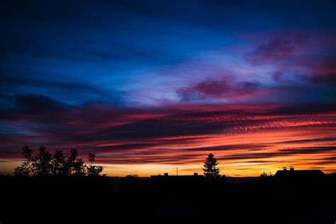 Colorful sunset sky clouds Photograph by Mario Cehulic - Fine Art America