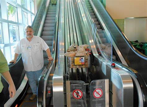 What is the difference between an elevator and an escalator