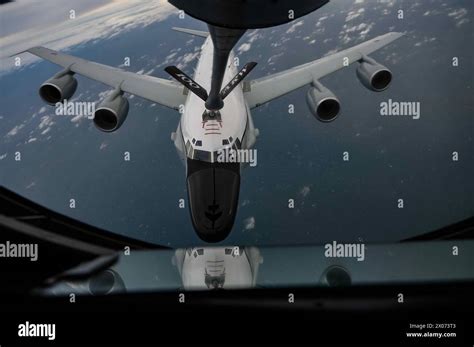 A Royal Air Force RC-135 Rivet Joint from the 51st Squadron, RAF Waddington, receives fuel from ...