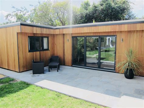 A 55 sqm Garden Annexe by EGR, cedar cladding, Bi-fold aluminium doors, sedum roof, contemporary ...