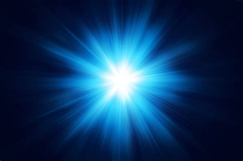 Blue light flare background - PSDgraphics