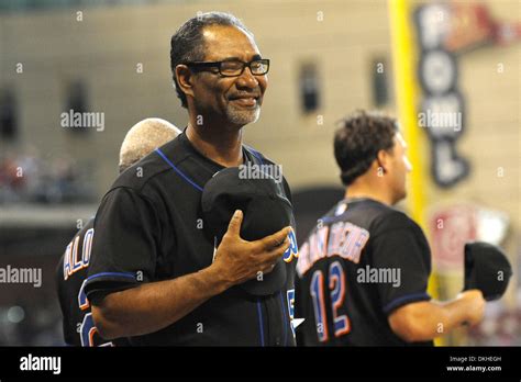 New York Mets manager, Jerry Manuel, stands for the national anthem during a matchup between the ...