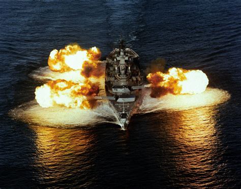 USS New Jersey firing her main guns both to port and starboard in 1986 ...