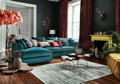 Eclectic colorful living room decor with teal velvet sectional sofa